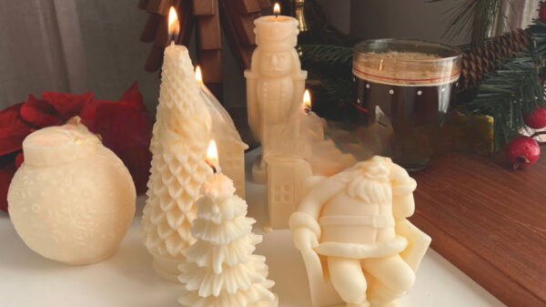 Warm Glow Of A Christmas Candle Brings Holiday Cheer