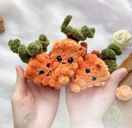 Crochet Carrot Amigurumi Pattern with Smiling Faces