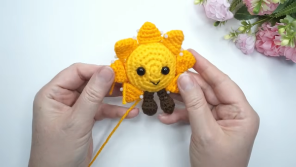 Crochet Sunshine Keychain Amigurumi Pattern with Smiling Face