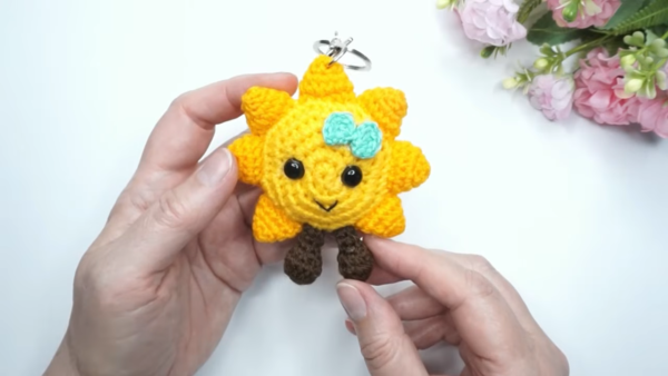 Crochet Sunshine Keychain Amigurumi Pattern with Smiling Face