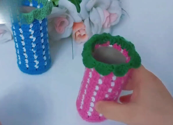 Finished pink and blue jar covers