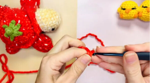 Starting red yarn slip knot on hook