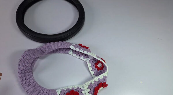 Comparing crochet cover against original wheel size