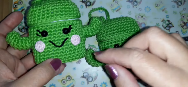 Finished green crochet airpods case with face