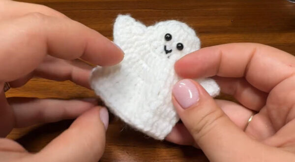 Finished mini ghost amigurumi with face