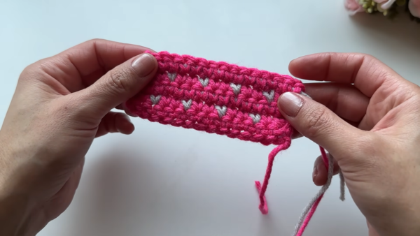 Finished pink swatch with heart pattern