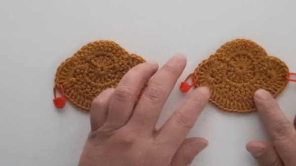 Joining colorful crochet triangle patches together