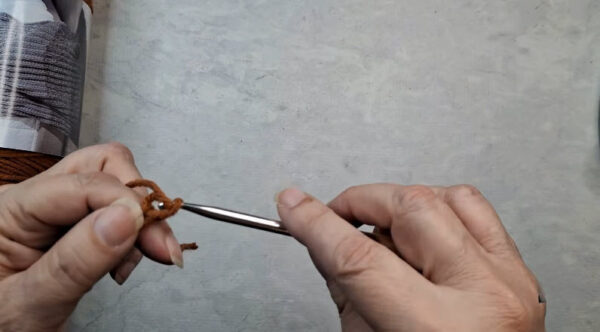 Making a slip knot with rust crochet yarn