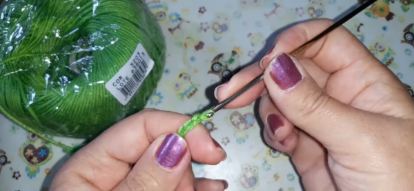 Starting magic ring for green crochet airpods case