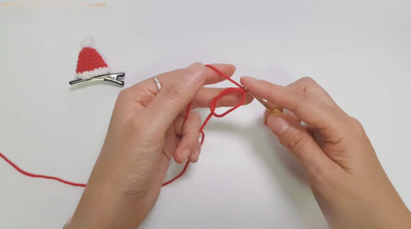 Starting magic ring for mini santa hat ornament