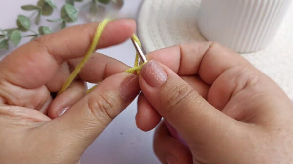 Starting magic ring with yellow yarn