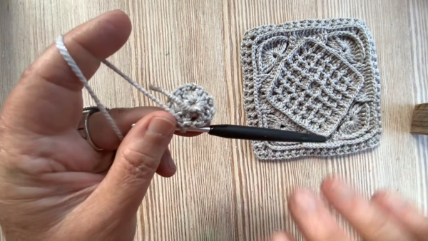 Starting new granny square for crochet chemo beanie