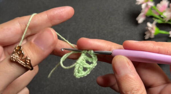 Treble and chain stitches forming petal shape