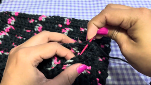 Weaving in yarn ends with needle