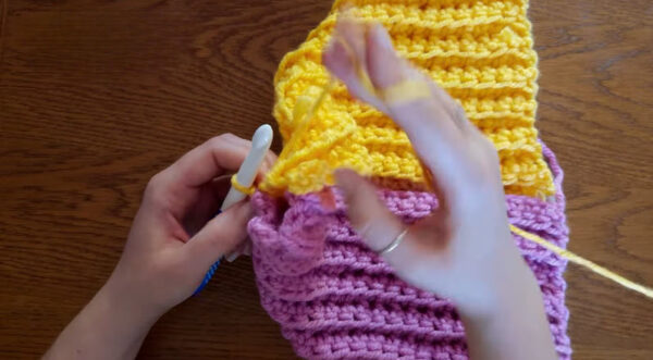 Yellow and purple panels slip stitched around the edge.