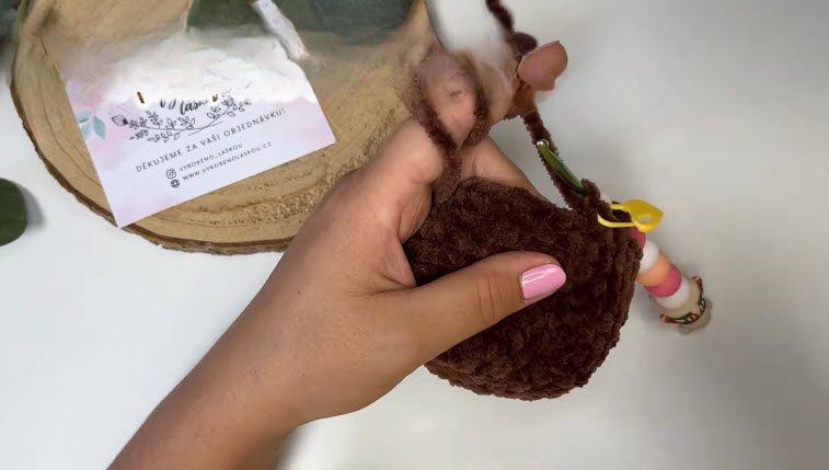Crochet round twelve in brown plush yarn.