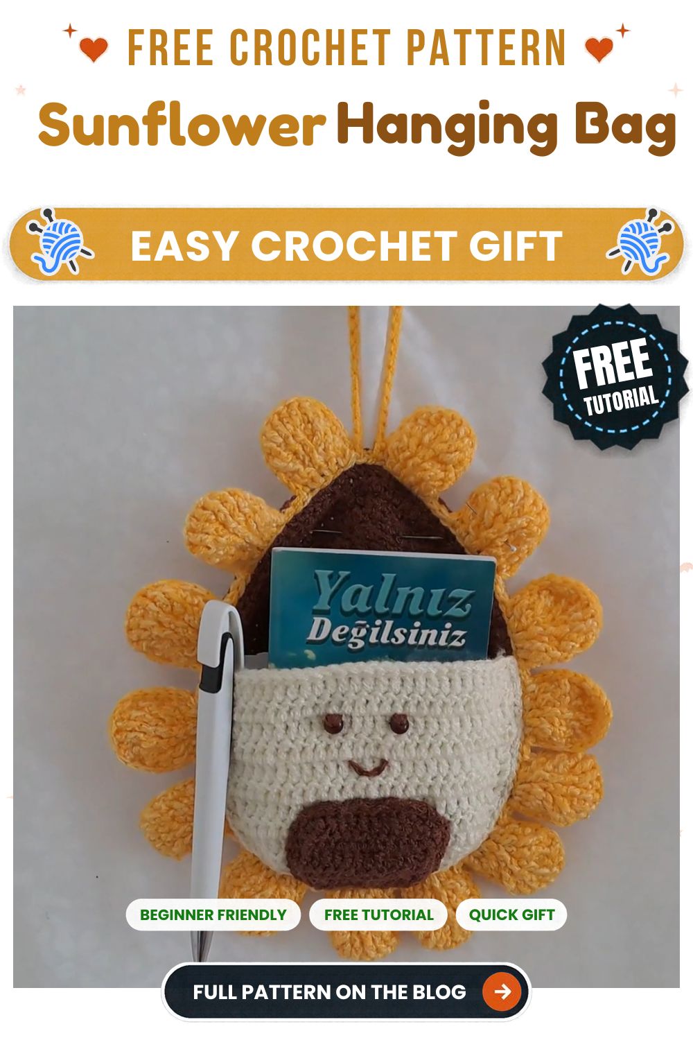 Handmade crochet sunflower wall hanging pouch hung on a wall