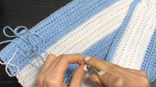 Joining striped panels of the crochet Argentina sweater