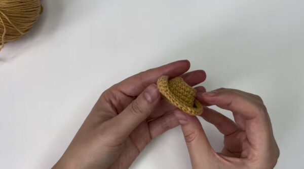 Round 11 Crocheting the cowboy hat brim.