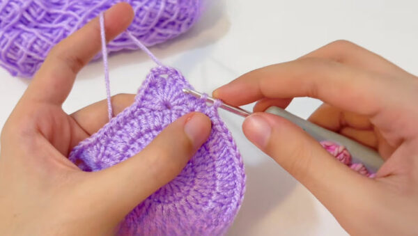 Shaping the second ear at the top of the circle.