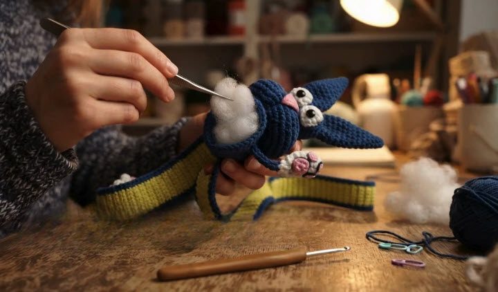 Bunny head being stuffed with fiberfill