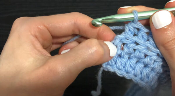 Working back loop only stitches on light blue yarn