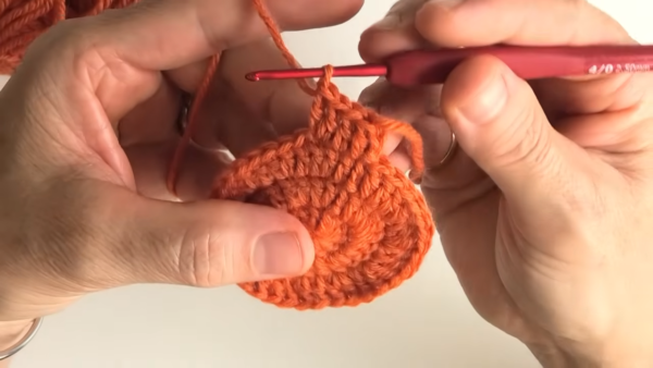 Orange circle growing wider with each round